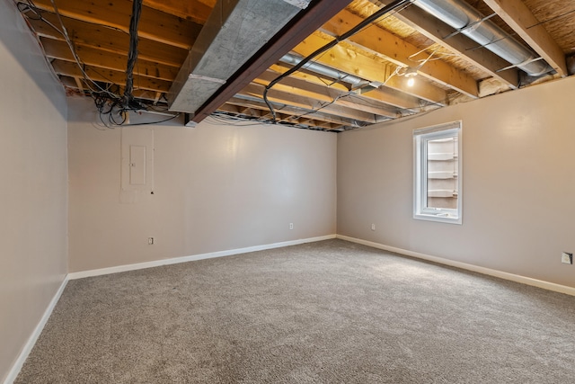 basement with carpet floors and baseboards