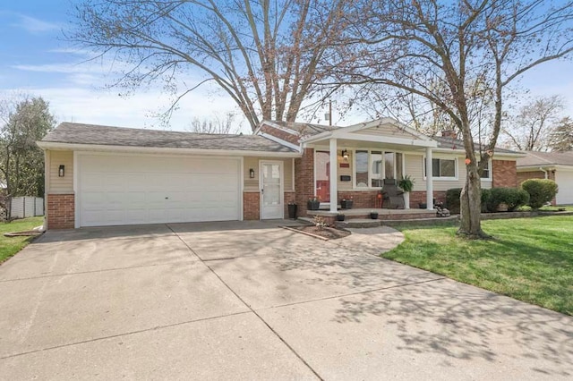 single story home with a front lawn, driveway, a porch, brick siding, and an attached garage