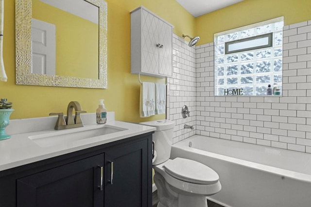 full bath featuring toilet, vanity, and shower / tub combination