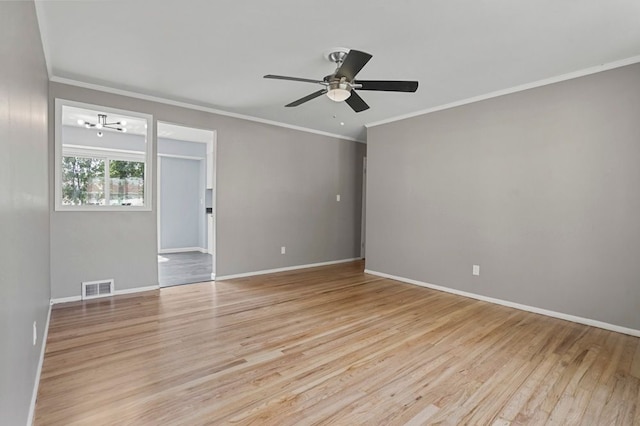 unfurnished room featuring light wood-style flooring, baseboards, visible vents, ceiling fan with notable chandelier, and crown molding