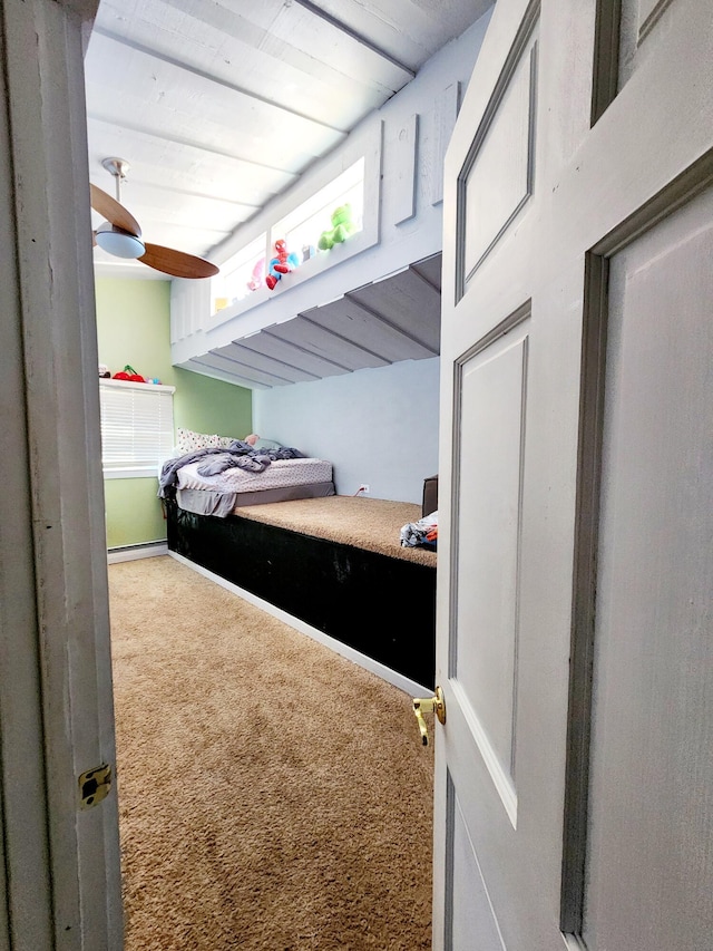 carpeted bedroom featuring wooden ceiling