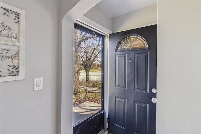 entryway featuring arched walkways