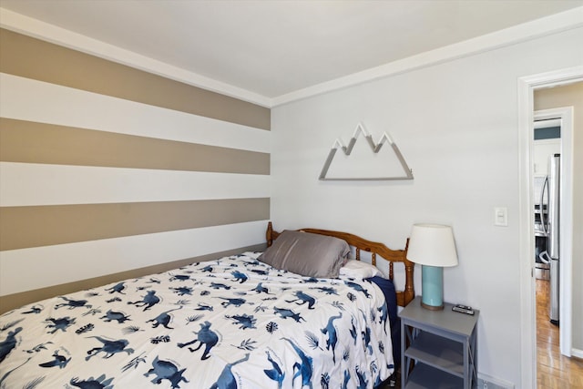 bedroom featuring baseboards