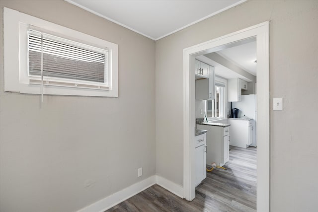 23737 Couzens Ave, Hazel Park, MI 48030 - hall with baseboards, ornamental molding, and wood finished floors