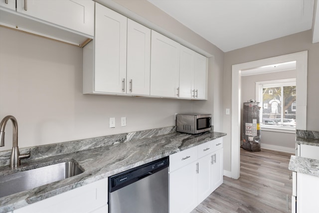 23737 Couzens Ave, Hazel Park, MI 48030 - kitchen featuring white cabinets, light wood finished floors, appliances with stainless steel finishes, and a sink