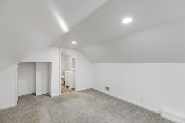 23737 Couzens Ave, Hazel Park, MI 48030 - bonus room featuring vaulted ceiling, baseboards, carpet flooring, visible vents, and recessed lighting