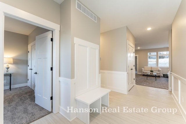 mudroom featuring visible vents, recessed lighting, and light wood-style floors