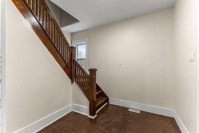 1409 Charter St, Lincoln Park, MI 48146 - stairs featuring visible vents and baseboards