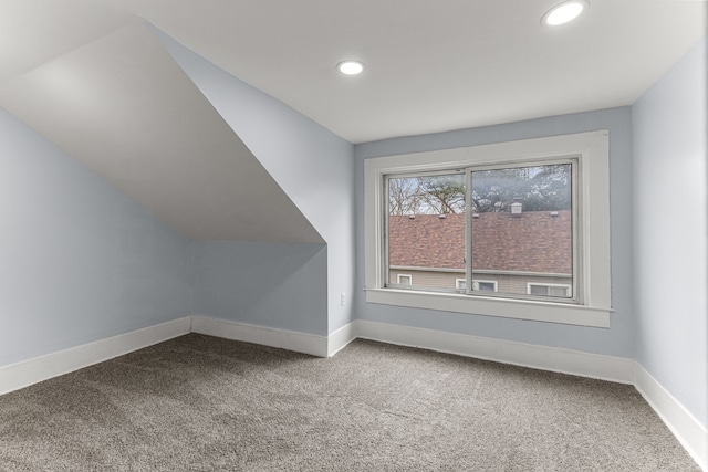 1409 Charter St, Lincoln Park, MI 48146 - bonus room featuring recessed lighting, lofted ceiling, baseboards, and carpet floors