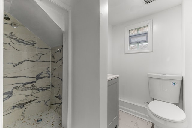 1409 Charter St, Lincoln Park, MI 48146 - bathroom featuring toilet, vanity, marble finish floor, and a marble finish shower
