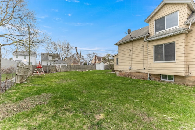 1409 Charter St, Lincoln Park, MI 48146 - view of yard featuring a fenced backyard, a shed, and an outdoor structure