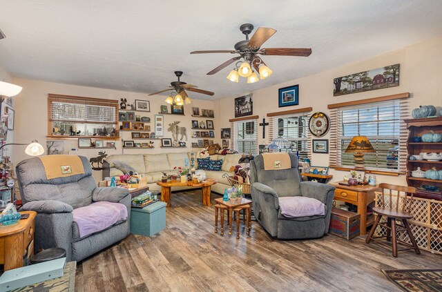 10975 Dorwood Rd, Burt, MI 48417 - living area featuring plenty of natural light, wood finished floors, and ceiling fan