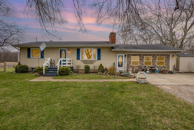 10975 Dorwood Rd, Burt, MI 48417 - ranch-style house with a chimney and a front lawn