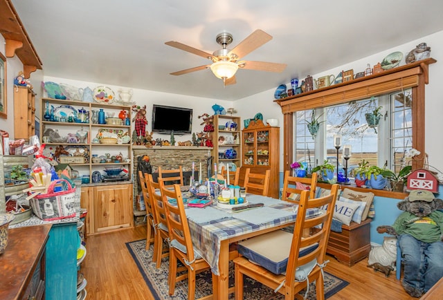 10975 Dorwood Rd, Burt, MI 48417 - dining space with light wood-style flooring and ceiling fan