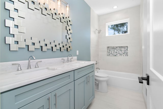 full bathroom featuring tub / shower combination, double vanity, toilet, and a sink