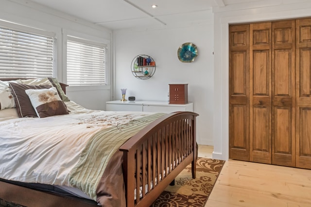 bedroom featuring light wood-type flooring