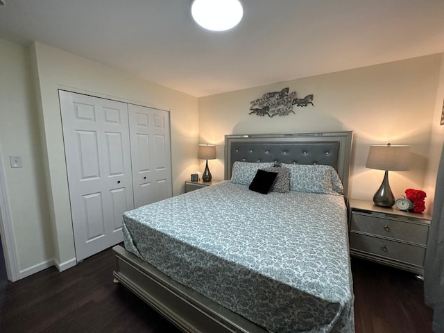 31042 Wellston Dr, Warren, MI 48093 - bedroom featuring a closet, dark wood-style floors, and baseboards