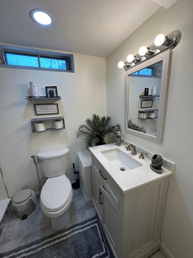 31042 Wellston Dr, Warren, MI 48093 - bathroom featuring toilet, vanity, and baseboards