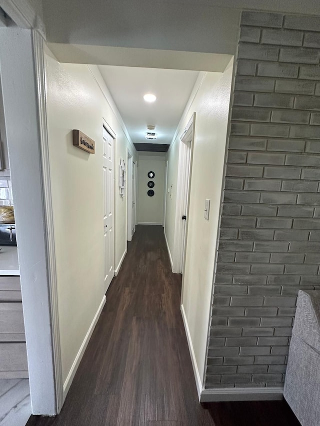 31042 Wellston Dr, Warren, MI 48093 - hall featuring dark wood-type flooring and baseboards