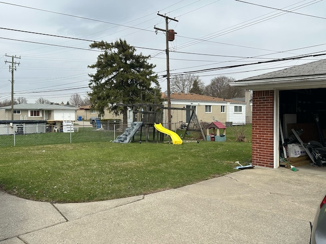 31042 Wellston Dr, Warren, MI 48093 - view of yard featuring fence and a playground