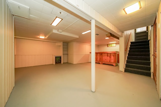 finished basement featuring stairway