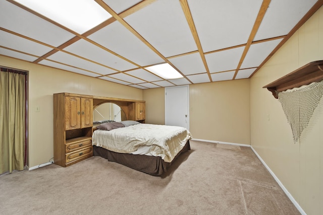 bedroom featuring carpet floors and baseboards