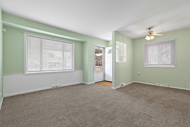 7957 Pine St, Taylor, MI 48180 - unfurnished room featuring carpet, visible vents, and a healthy amount of sunlight