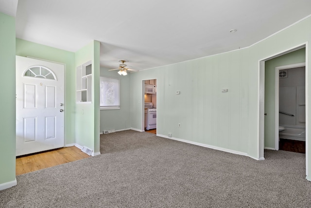 7957 Pine St, Taylor, MI 48180 - carpeted entryway with baseboards, visible vents, and ceiling fan