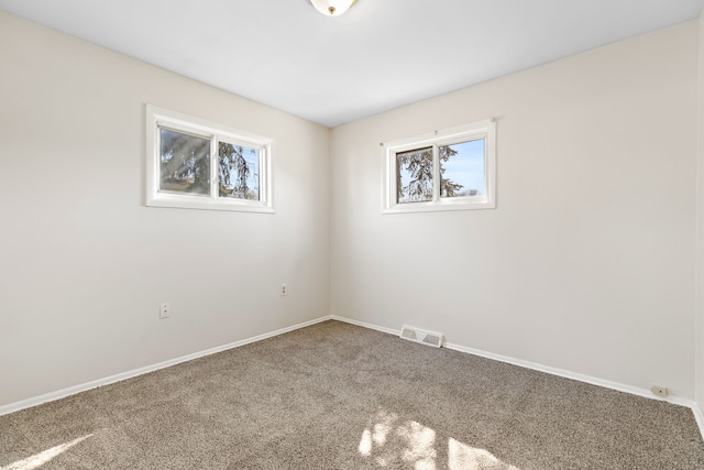 7957 Pine St, Taylor, MI 48180 - carpeted spare room with visible vents and baseboards