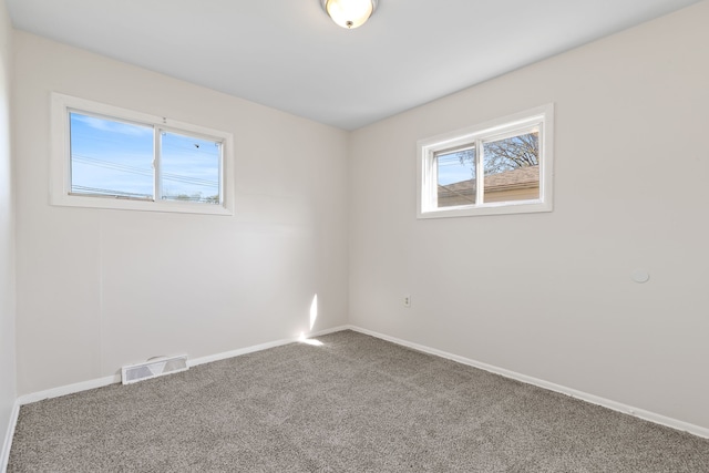 7957 Pine St, Taylor, MI 48180 - carpeted spare room featuring visible vents and baseboards