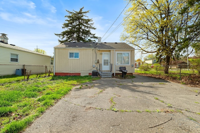 7957 Pine St, Taylor, MI 48180 - rear view of house with fence and entry steps