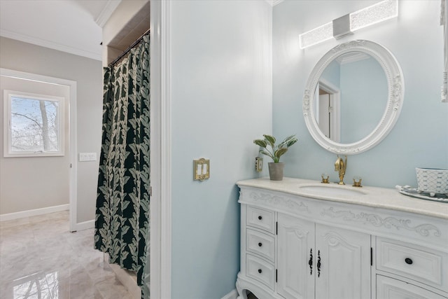 bathroom with crown molding, curtained shower, and vanity