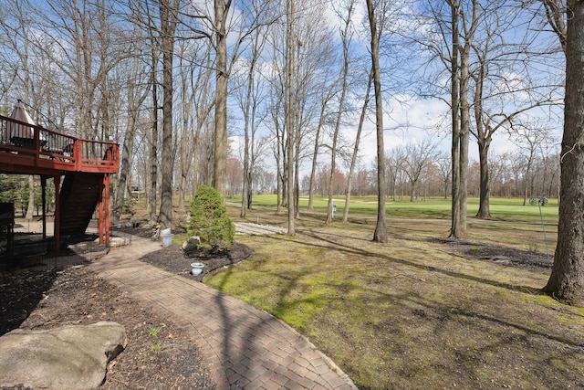 view of yard with a wooden deck