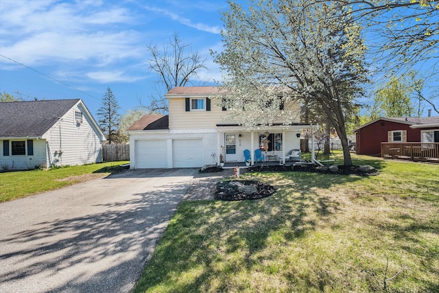 638 Franklin St, Linden, MI 48451 - view of front of home with covered porch, driveway, and an attached garage