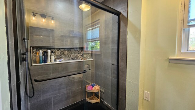 638 Franklin St, Linden, MI 48451 - full bath featuring a stall shower and plenty of natural light