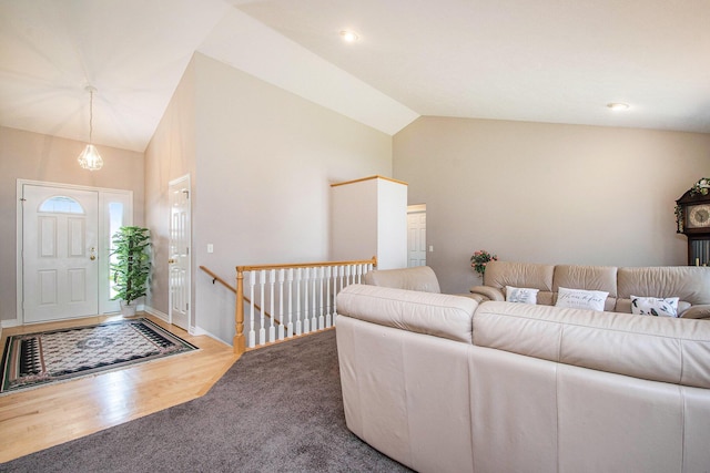 2511 Bowenton Pl SW, Wyoming, MI 49519 - living area featuring baseboards, high vaulted ceiling, and carpet floors