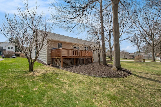 2511 Bowenton Pl SW, Wyoming, MI 49519 - view of yard featuring a deck