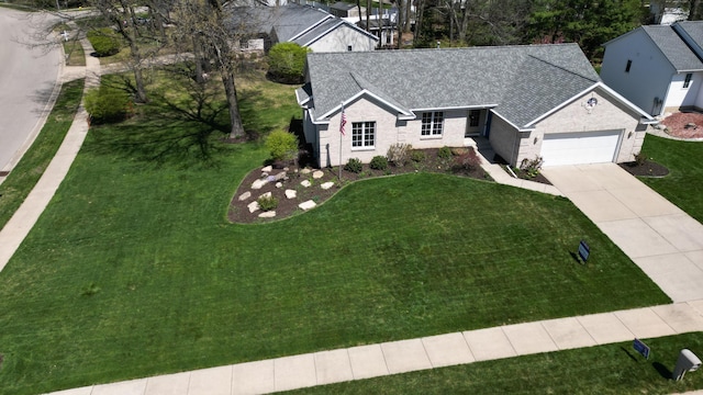2511 Bowenton Pl SW, Wyoming, MI 49519 - single story home featuring driveway, a shingled roof, an attached garage, and brick siding
