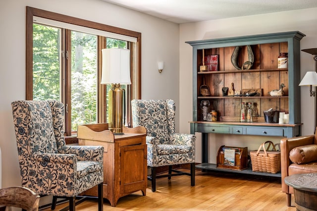sitting room featuring light wood-type flooring