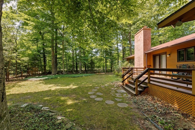 view of yard featuring a deck