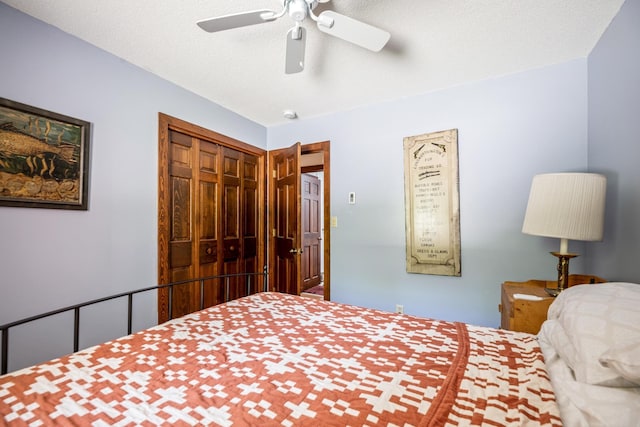 bedroom featuring a closet and ceiling fan
