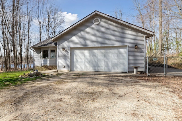 view of side of home with fence