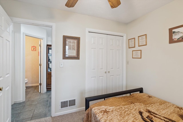 bedroom featuring a closet, ceiling fan, baseboards, and visible vents