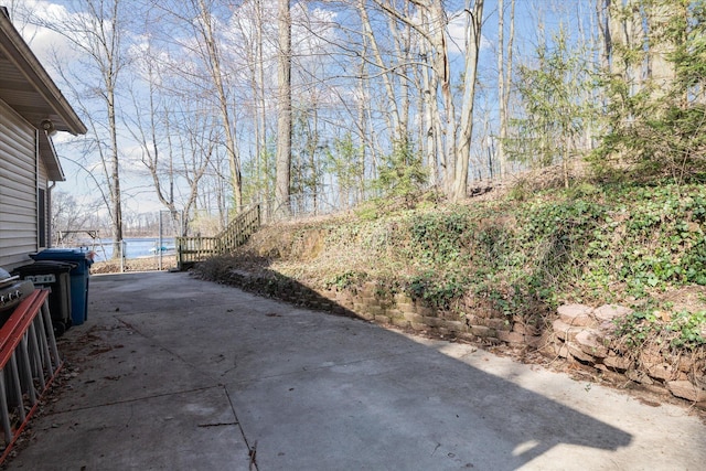 view of patio / terrace featuring fence