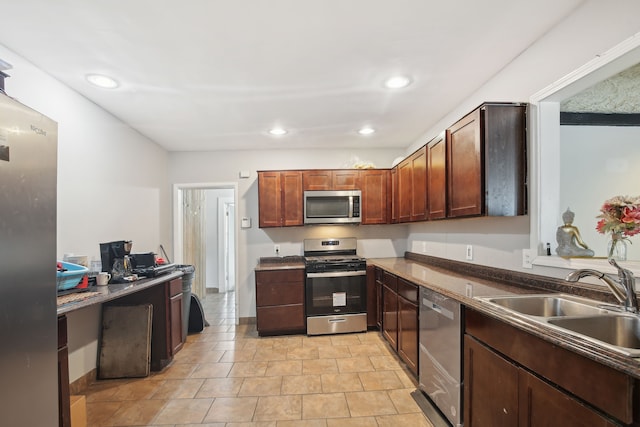 27423 W 12 Mile Rd, Farmington Hills, MI 48334 - kitchen with stainless steel appliances, recessed lighting, a sink, and dark countertops