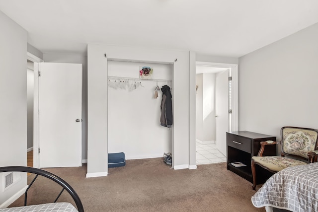 27423 W 12 Mile Rd, Farmington Hills, MI 48334 - carpeted bedroom featuring a closet, baseboards, and visible vents