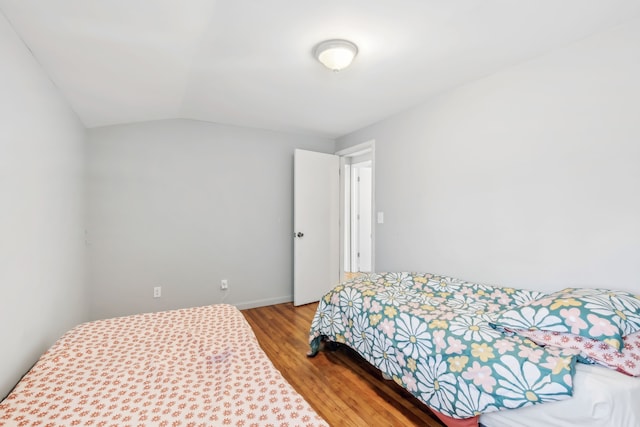 27423 W 12 Mile Rd, Farmington Hills, MI 48334 - bedroom with wood finished floors and lofted ceiling