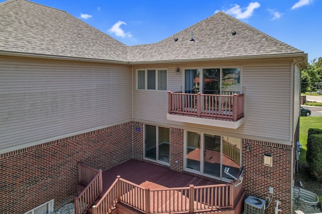 29709 Francesca Ln, Chesterfield, MI 48047 - back of house with brick siding, a deck, cooling unit, and a shingled roof