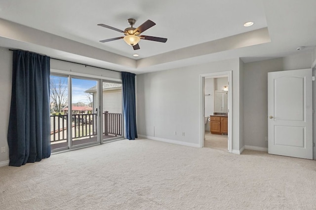 29709 Francesca Ln, Chesterfield, MI 48047 - unfurnished bedroom with baseboards, a raised ceiling, light colored carpet, and access to exterior
