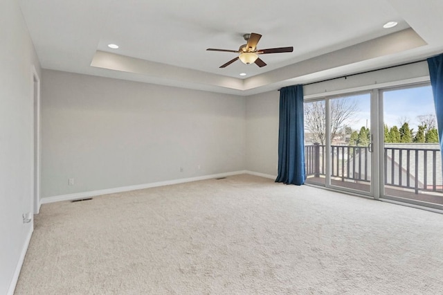 29709 Francesca Ln, Chesterfield, MI 48047 - unfurnished room with a tray ceiling, carpet floors, baseboards, and ceiling fan